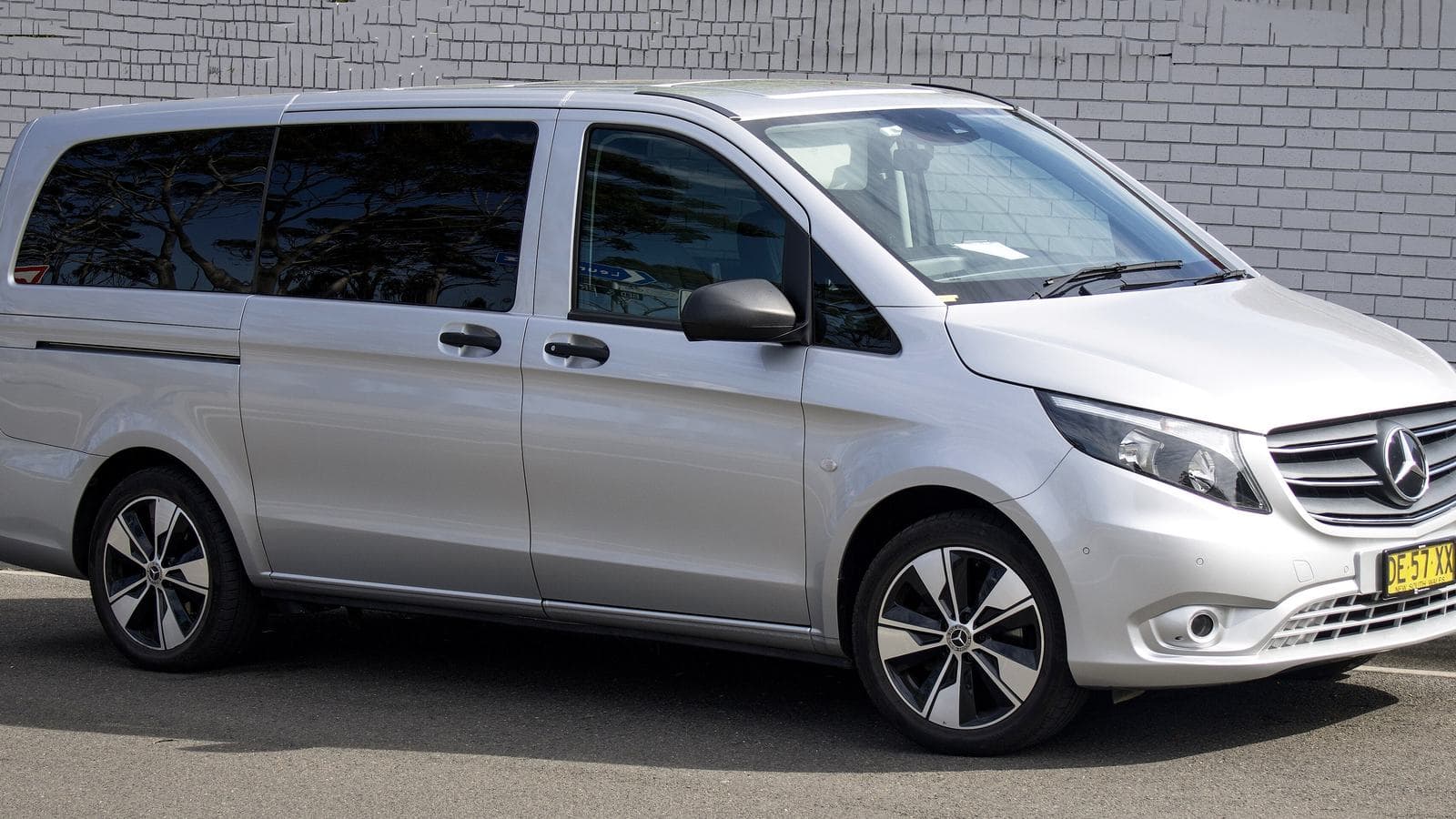 A silver Mercedes-Benz Vito Tourer passenger van of the kind used for private transfers