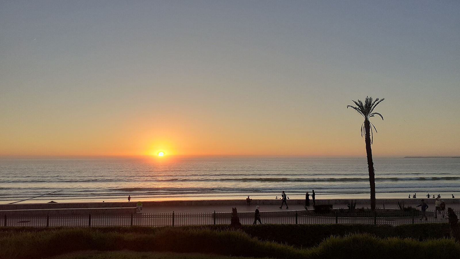 Sunset over the long sandy beach of Agadir